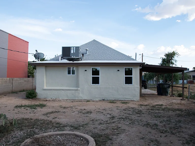 Huge back yard with plenty of space to host guests and grill.