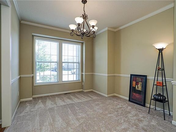 Formal dining room has new carpet