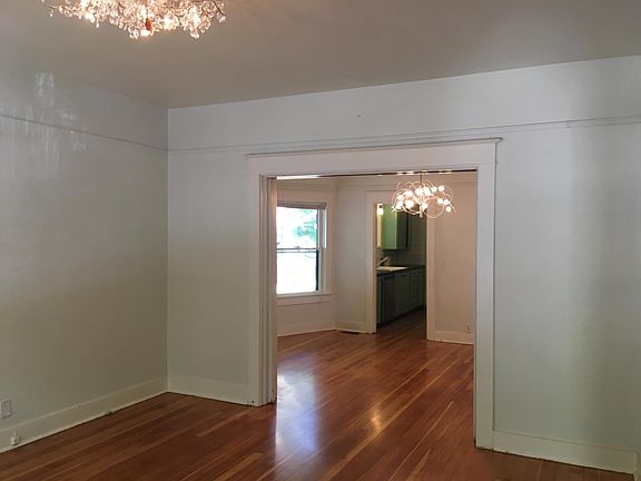 Newly painted and floors refinished. Designer lighting. 9 foot ceilings, large windows, pocket doors and picture rails.