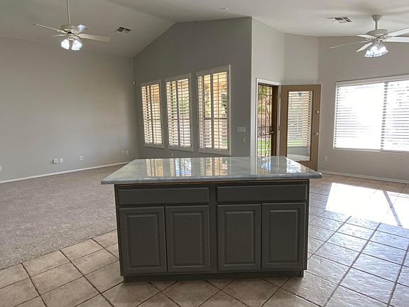 View to living room, back door and dining area