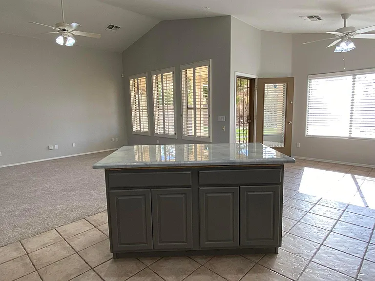 View to living room, back door and dining area
