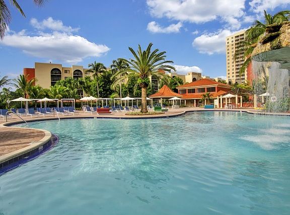Relax by our Waterfall Swimming Pool