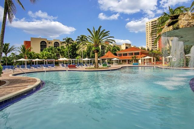 Relax by our Waterfall Swimming Pool
