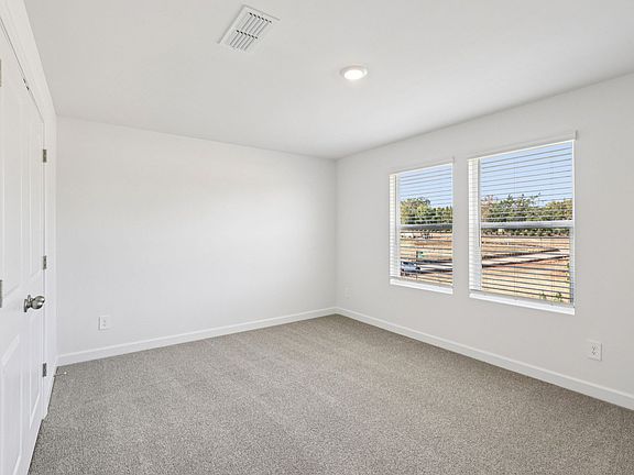 Turn a secondary bedroom into a private guest space.