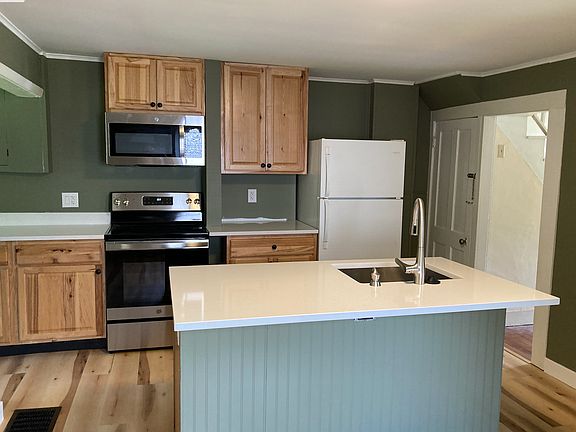 Kitchen with garbage disposal; dishwasher. (Washer/Dryer in side nook, not shown.)