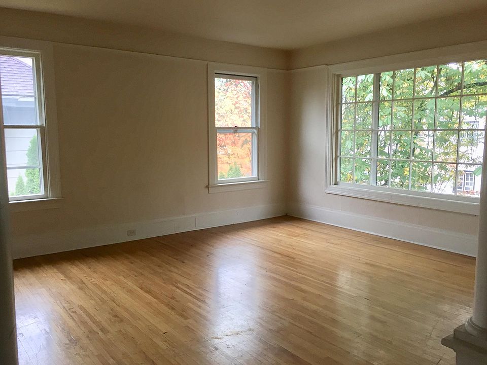 Large light living room in upper floor rental.