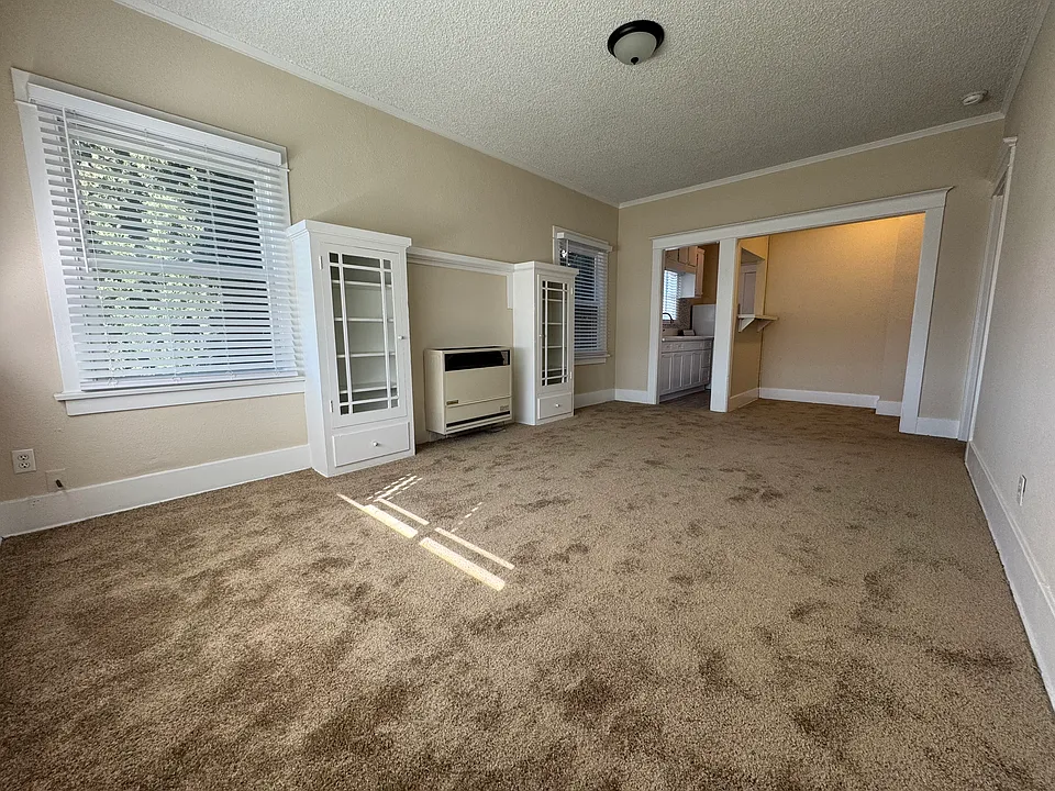 Newly renovated living room as viewed from the primary entrance door.