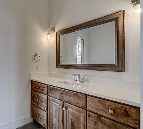 Vanity is separate from the bathroom and toilet