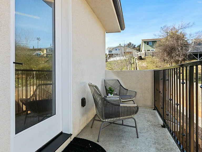 Small front patio landing designated for the unit. It is located on top of the stairs landing, next to the front door.