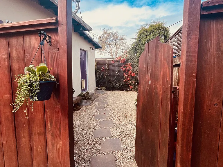 Entryway to private gated yard