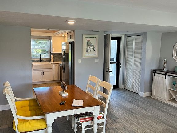 view from main living area towards the kitchen, which was totally remodeled with all new appliances