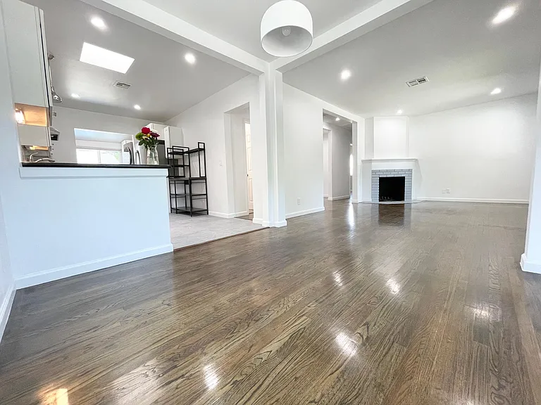 Living room - front door is to the right and kitchen to the left