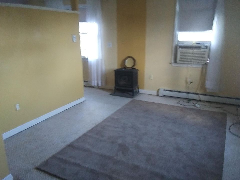 Living room, carpets will be cleaned and walls painted before move in.