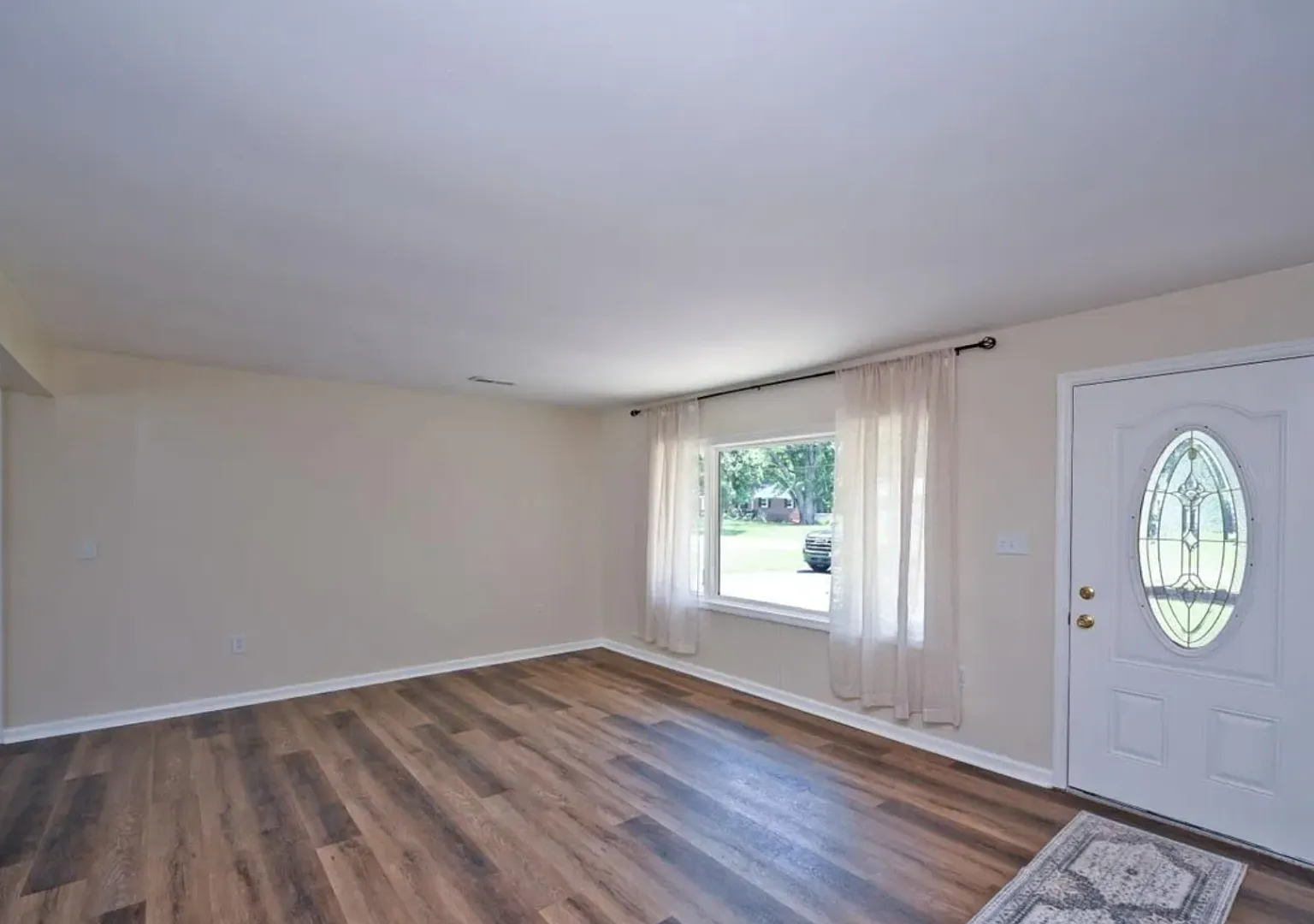 Brand-New 4-Bed Milford Home with Sunroom, Large Backyard & Patio — Photo 3