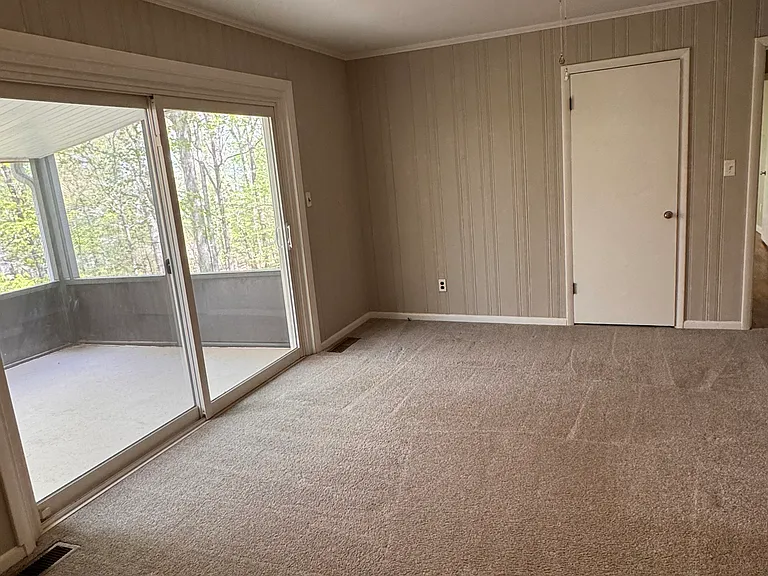 2 of 2 Living Spaces. Has Access to the Private Screened in Deck and Kitchen