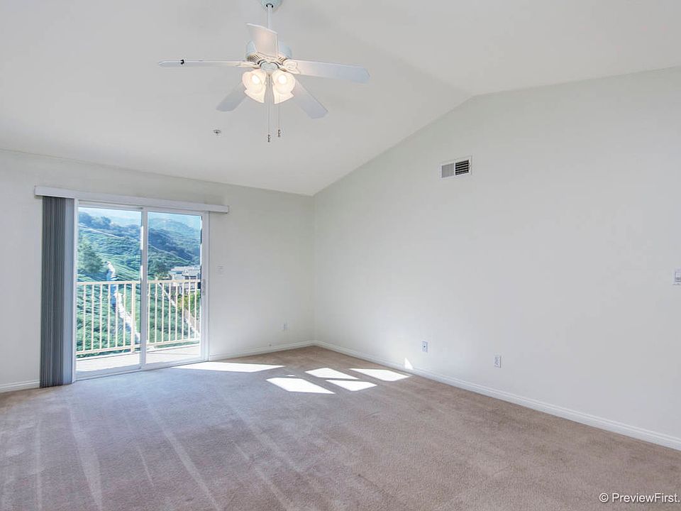master bedroom with balcony