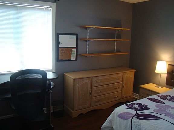 Room 2 again. Double closet doors with extended space.. 2 windows in this room. Shelves for books or personal belonings.