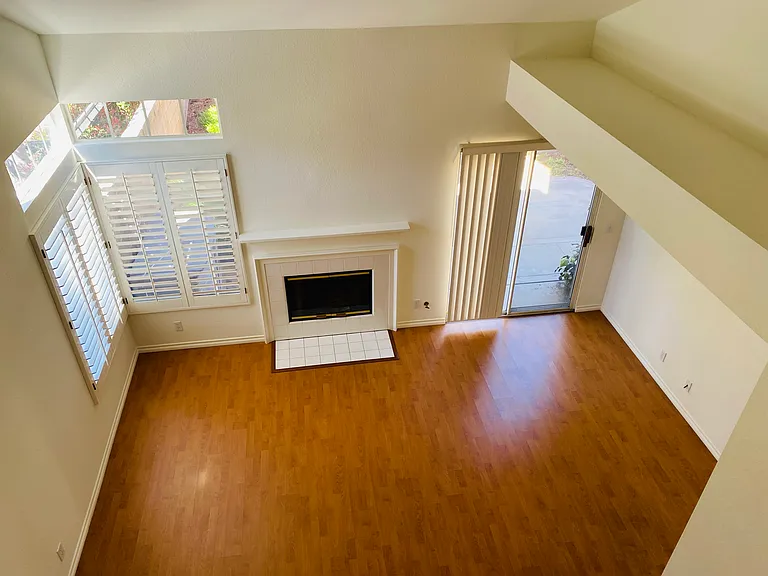 Open living area with airy high ceilings