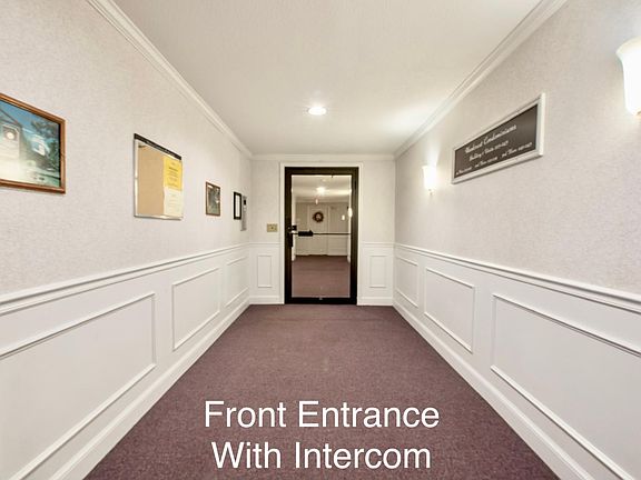Guests can also be welcomed in by intercom system in condo unit to unlock front door.