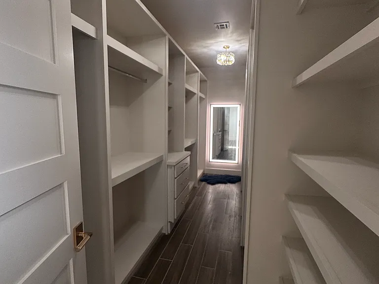 Large primary closet with LED mirror