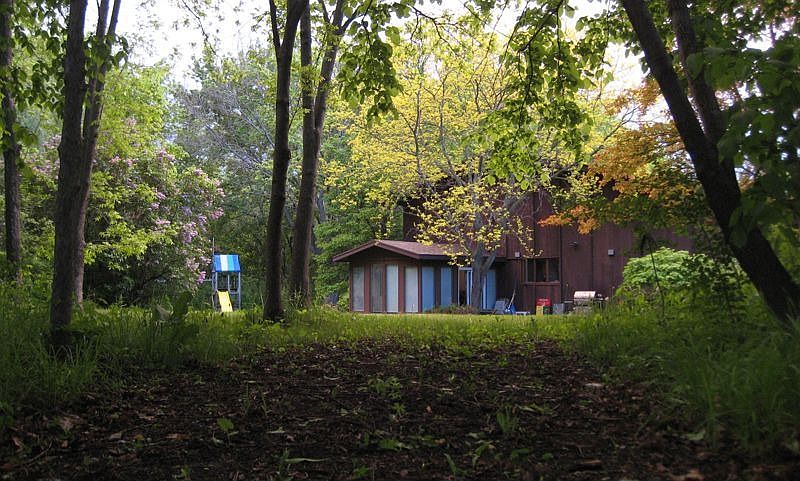 Tucked beautifully in private woods!