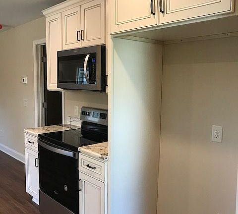 Kitchen - Electric Range, Mircowave, and Refrigerator (no photographed)