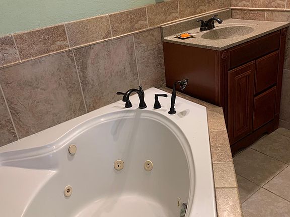 relax in a jacuzzi tub