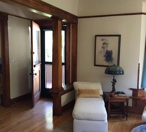 Living room to hallway exit to porch