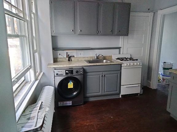 Recently refreshed kitchen with all-in-one washer dryer