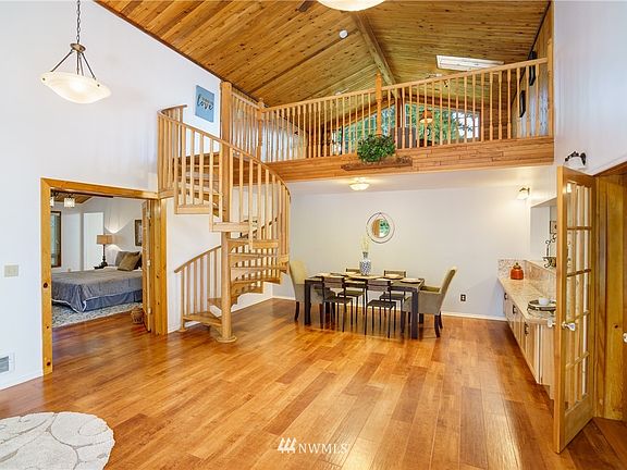 Spiral stairway leads to loft. And is the hub of the house. 