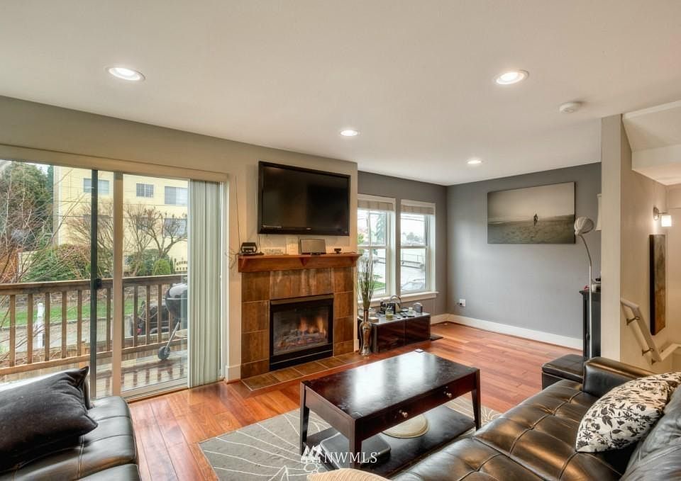Open floor plan: living room, dining area.