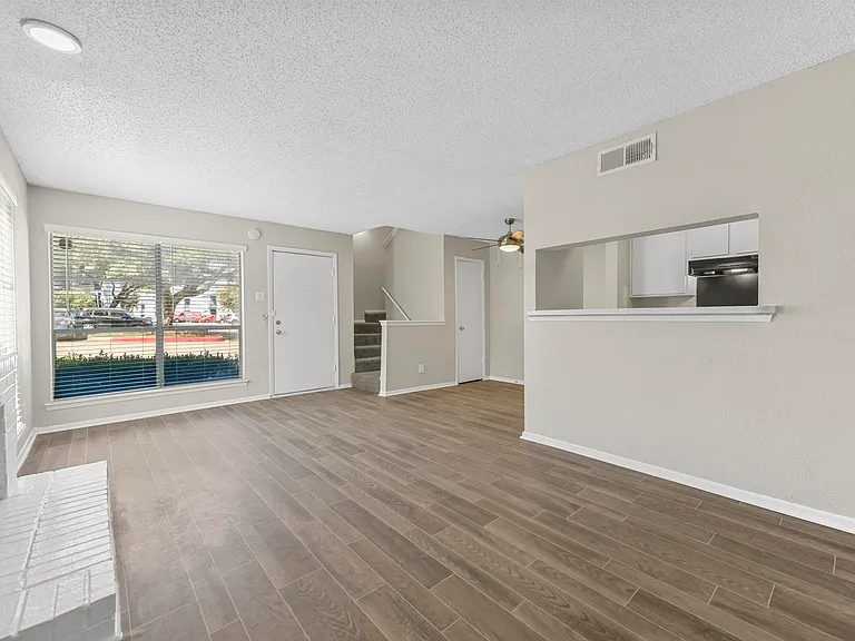 Spacious open floor plan with access to kitchen and fireplace