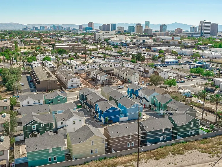 View of community of single family homes and City of Phoenix.