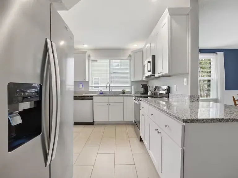 The kitchen is super bright and clean.