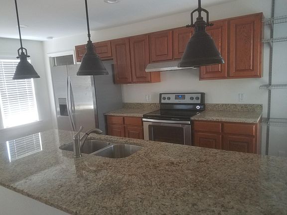 Kitchen with granite counters and center isle.