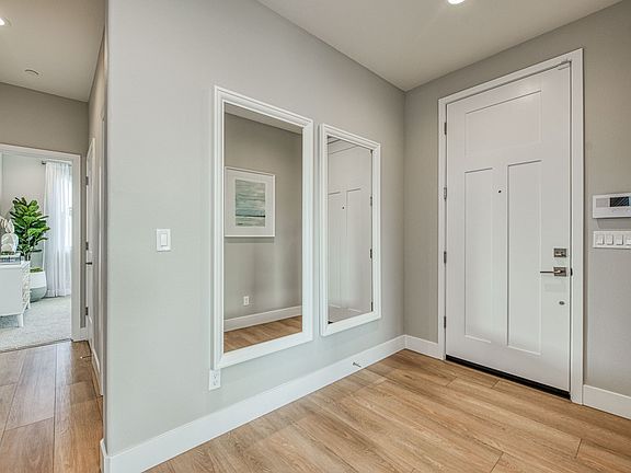 Entry hallway to living space private first floor bedroom