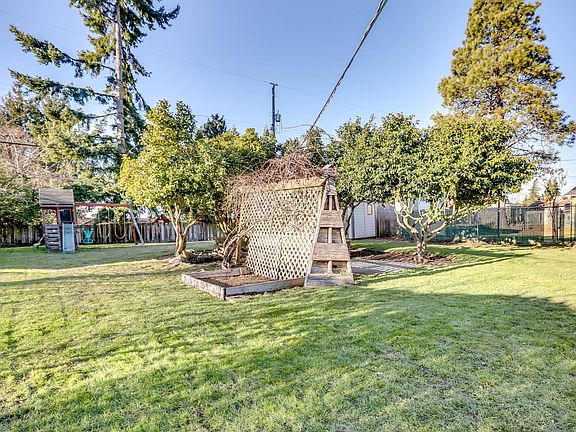 Large backyard for gardening and play 