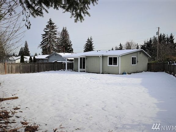 Enormous fenced back yard. 