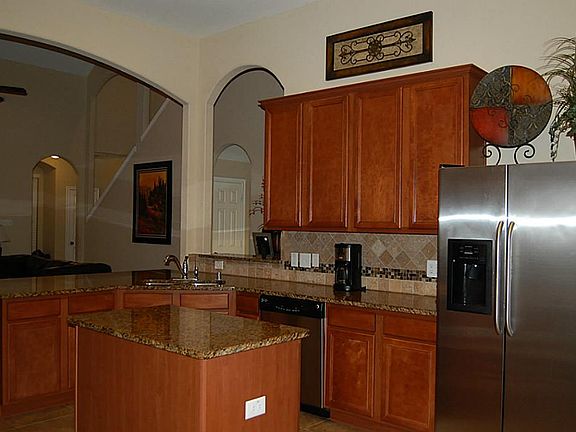Granite counter tops, stainless steel appliances, Under mount sink, Refrigerator to stay
