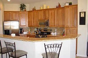 Fully Upgraded Kitchen Including Stainless Steel and Granite Counter Tops