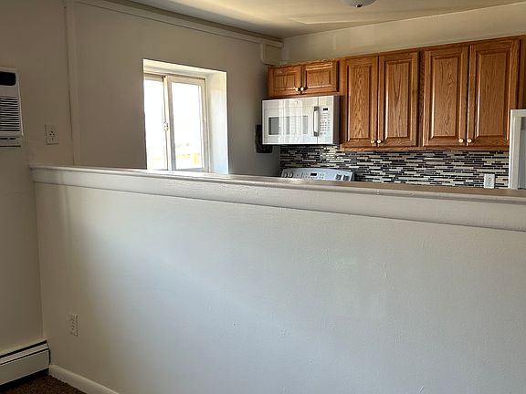 Half wall between kitchen & living room.