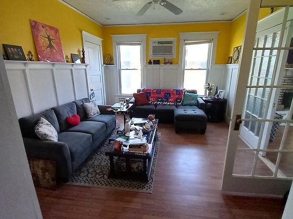 living space (door in back left corner of image leads to 2nd bedroom or office. French doors on right lead to master bedroom.