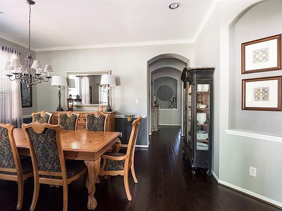 The Foyer opens to the Formal Dining Room on your left. The large formal dining room measures 14 x 16 which provides plenty of room for week-night dinners as well as large scale entertaining of 8-10 guests.