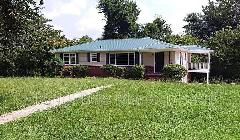 7001 Rowan Rd — Photo 1