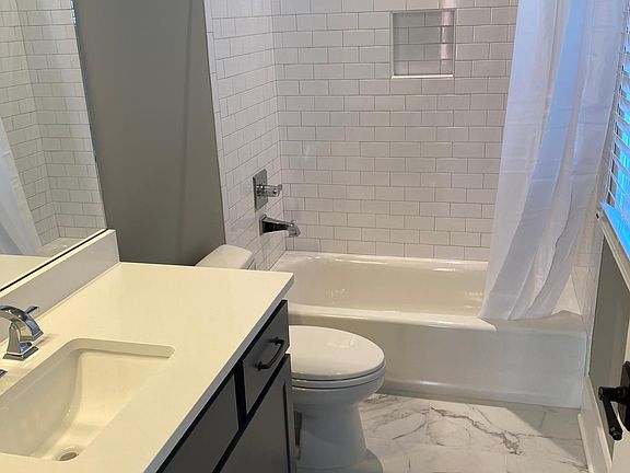 Quartz / tile bathrooms