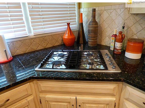 Gas cook top with fan