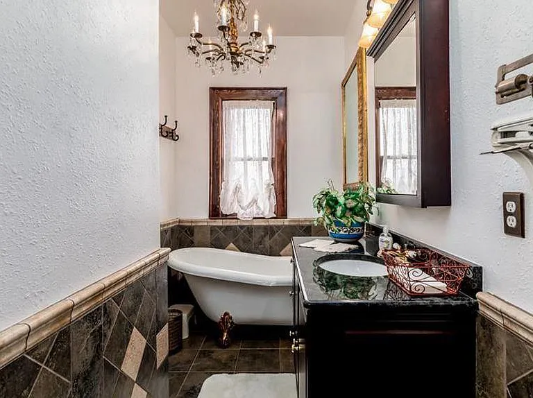 Shared Bathroom on 2nd Floor with Clawfoot Bathtub and Shower.