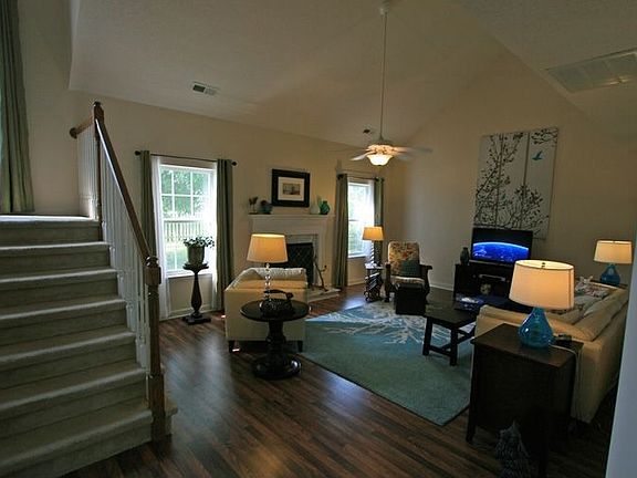 Living area w/ vaulted ceilings