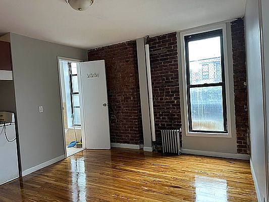 2nd image of 411 E 114th St APT 6