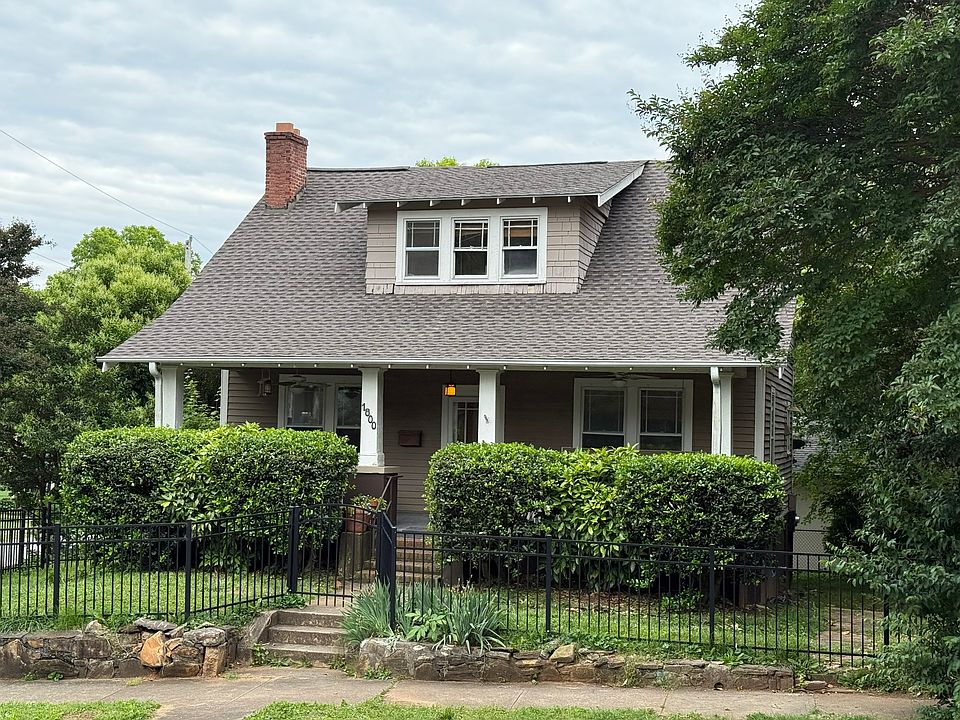 New roof installed May 2025. Energy efficient home with great shade trees and decorative arched front gate.